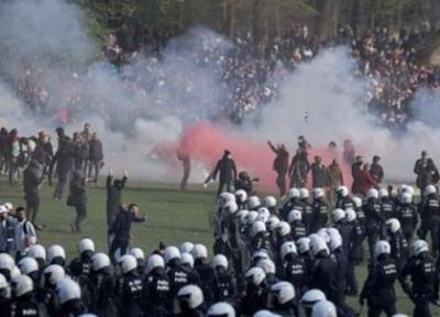 پرتاب گازاشک آور به سوی هزاران معترض به محدودیت کرونا در بروکسل